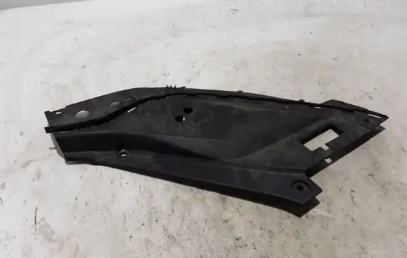 Engine bonnet/hood lock trim molding
