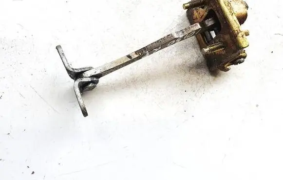 Front door check strap stopper