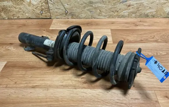 Front shock absorber with coil spring