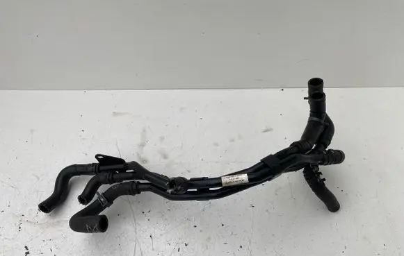 Volkswagen Golf VII Engine coolant pipe/hose 5Q0121064BS 5Q0121065F