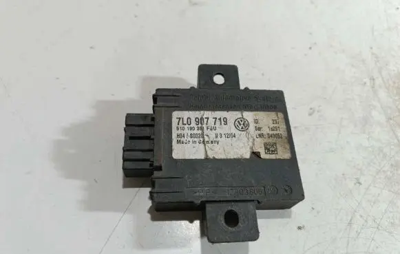Volkswagen Touareg I Alarm control unit/module 7L0907719