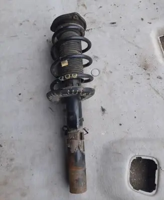 Volkswagen Fox Front shock absorber with coil spring