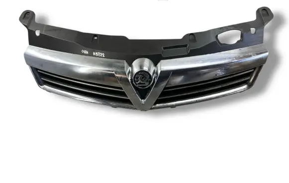 Opel Astra H Front bumper upper radiator grill 13225788 13225789
