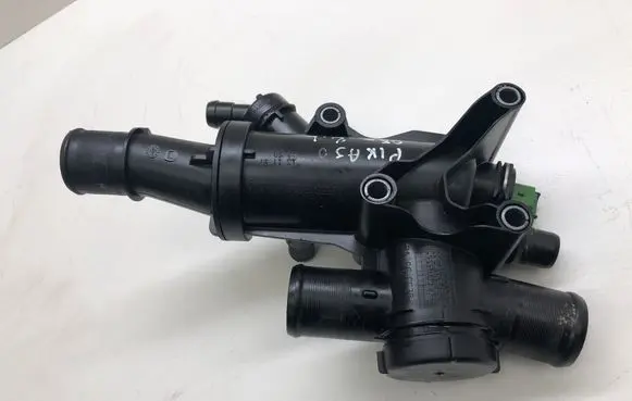 Thermostat/thermostat housing