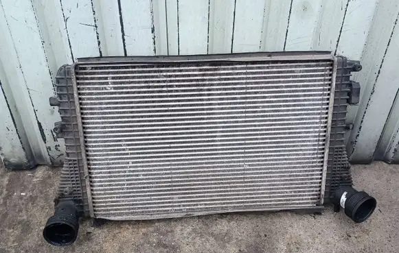 Volkswagen Golf V Intercooler radiator 1K0145803