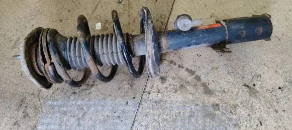 Toyota Avensis T250 Front shock absorber with coil spring JGM1029T