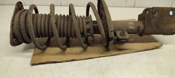 Front shock absorber with coil spring