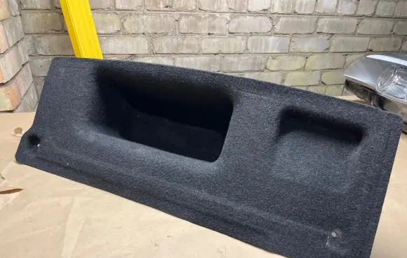 Trunk/boot lower side trim panel