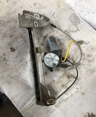 Mazda 323 F Rear door window regulator with motor