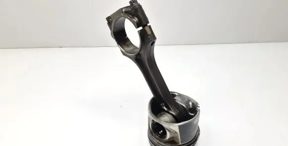 Piston with connecting rod