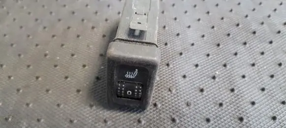 Seat heating switch