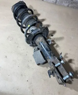 Front shock absorber with coil spring