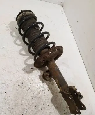 Opel Corsa D Front shock absorber with coil spring 13343098