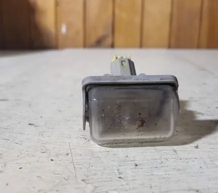 Mazda 6 Number plate light 13061971