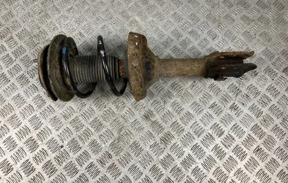 Subaru Outback Front shock absorber with coil spring 