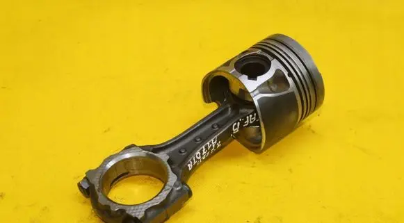Piston with connecting rod