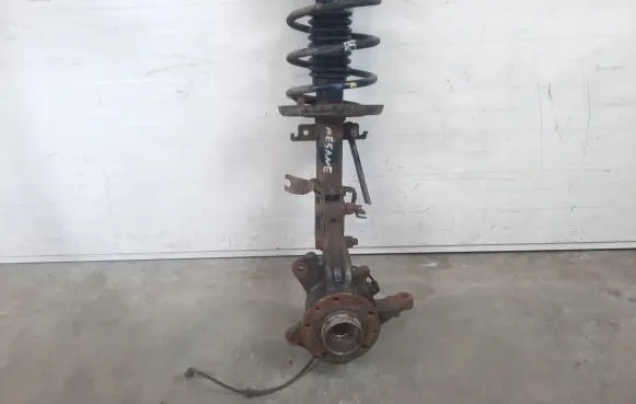 Renault Megane III Front shock absorber with coil spring