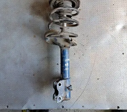 Nissan X-Trail T30 Front shock absorber with coil spring 2626623008 36266230008