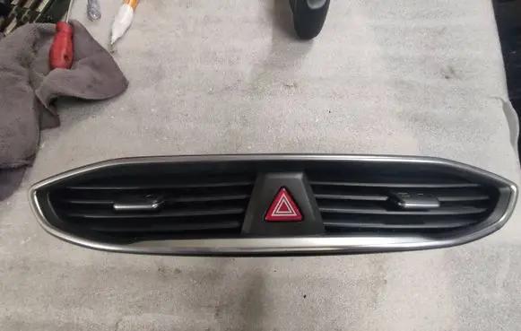 Dash center air vent grill