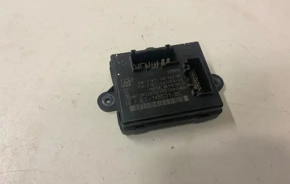 Ford Focus Door control unit/module F1ET14F142BC F1ET14B531BE F1ET14C064AE