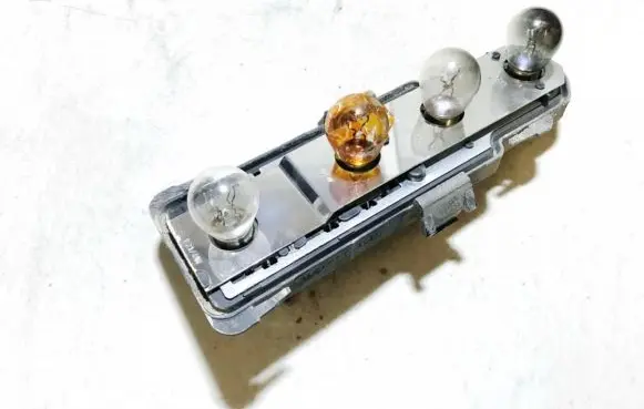 Mercedes-Benz ML W163 Tail light bulb cover holder