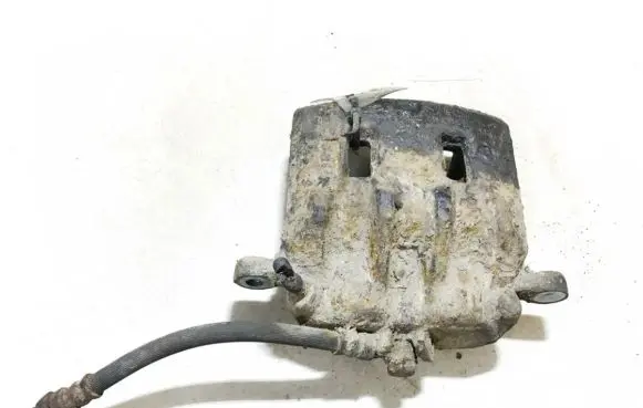 Subaru Forester SF Front brake caliper