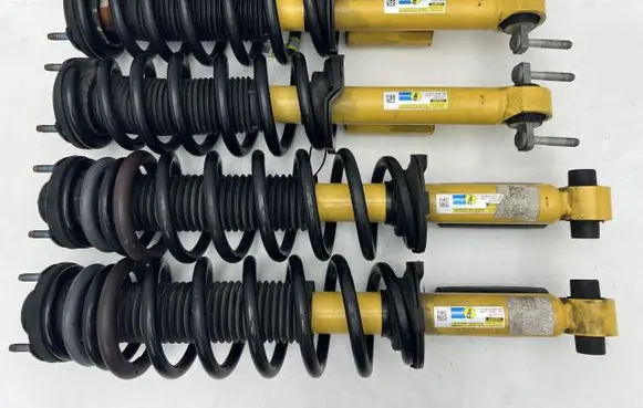 Front shock absorber with coil spring