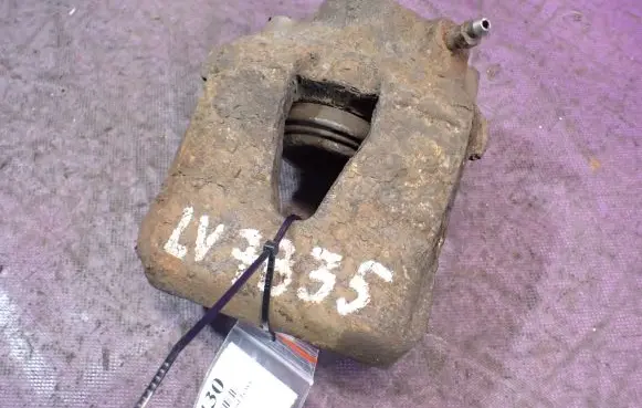 Volkswagen Golf IV Front brake caliper