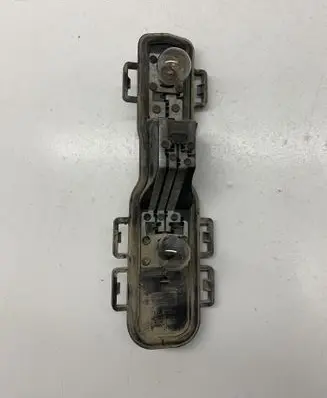 Nissan Primera Tail light bulb cover holder 89025242