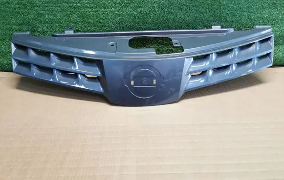 Nissan Note (E11) Front bumper upper radiator grill 9U100