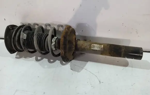 Volkswagen Golf VII Front shock absorber with coil spring 5Q0413023