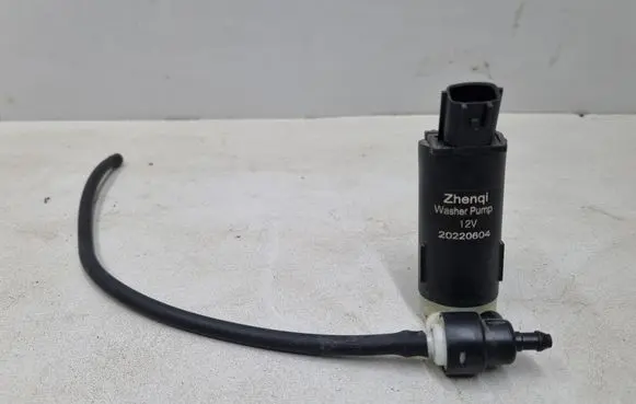 Dacia Spring Windscreen/windshield washer pump 