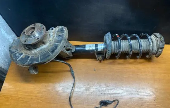 Volkswagen PASSAT B6 Front shock absorber with coil spring 3CAJ210207