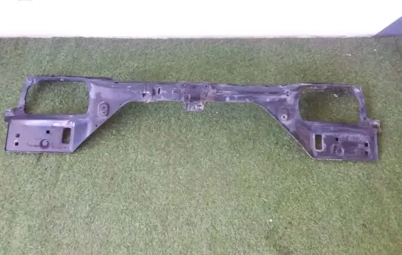 Top upper radiator support slam panel
