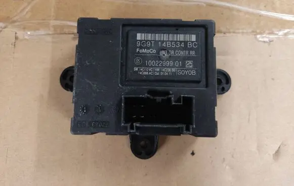 Volvo XC60 Door control unit/module 9G9T14B534BC 1002299901