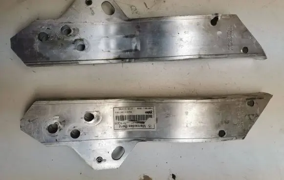 Radiator support slam panel bracket
