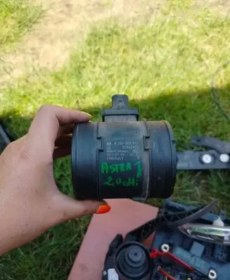 Opel Astra J Mass air flow meter 55562426 279574613 0281002912