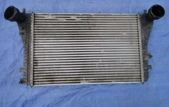 Volkswagen Golf V Intercooler radiator 1K0145803A