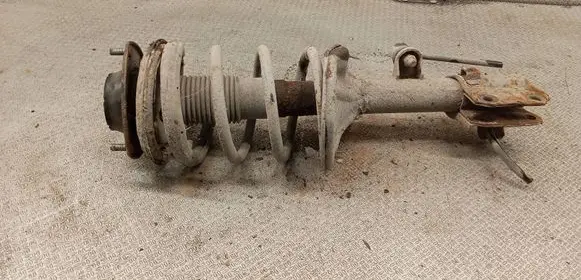 Hyundai Tucson JM Front shock absorber with coil spring 