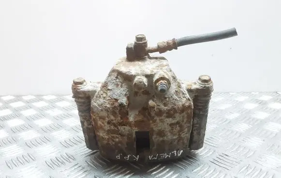 Nissan Almera N16 Front brake caliper