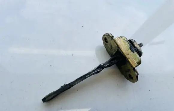 Nissan Micra Front door check strap stopper 