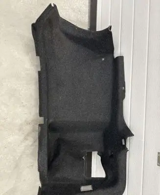 Trunk/boot lower side trim panel