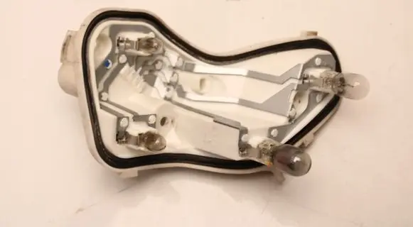 Opel Astra J Tail light bulb cover holder 13306460
