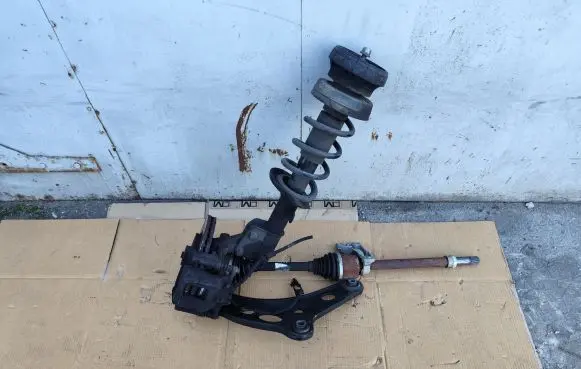 Front wheel hub spindle knuckle