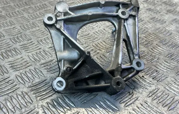 Chrysler Pacifica A/C compressor mount bracket 05281379AA 15634
