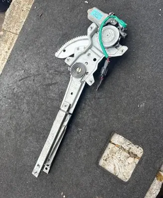 KIA Carens I Front door window regulator with motor XH504PO