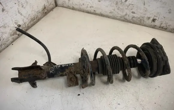 Nissan Tiida C11 Front shock absorber with coil spring