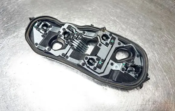 Opel Corsa D Tail light bulb cover holder 89037852A 0OPE4400