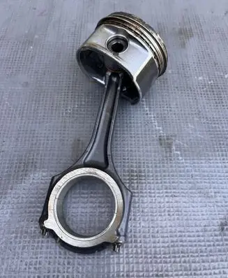 Piston with connecting rod