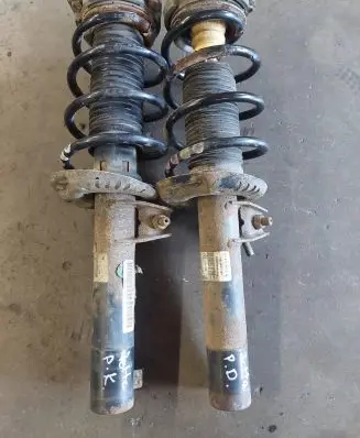 Volkswagen Jetta V Front shock absorber with coil spring 1t0413031g